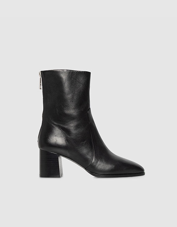 Women&rsquo;s black leather zipped heeled boots
