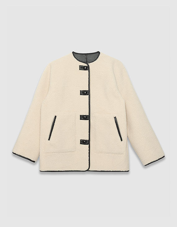 Women&rsquo;s black and ecru sherpa reversible coat