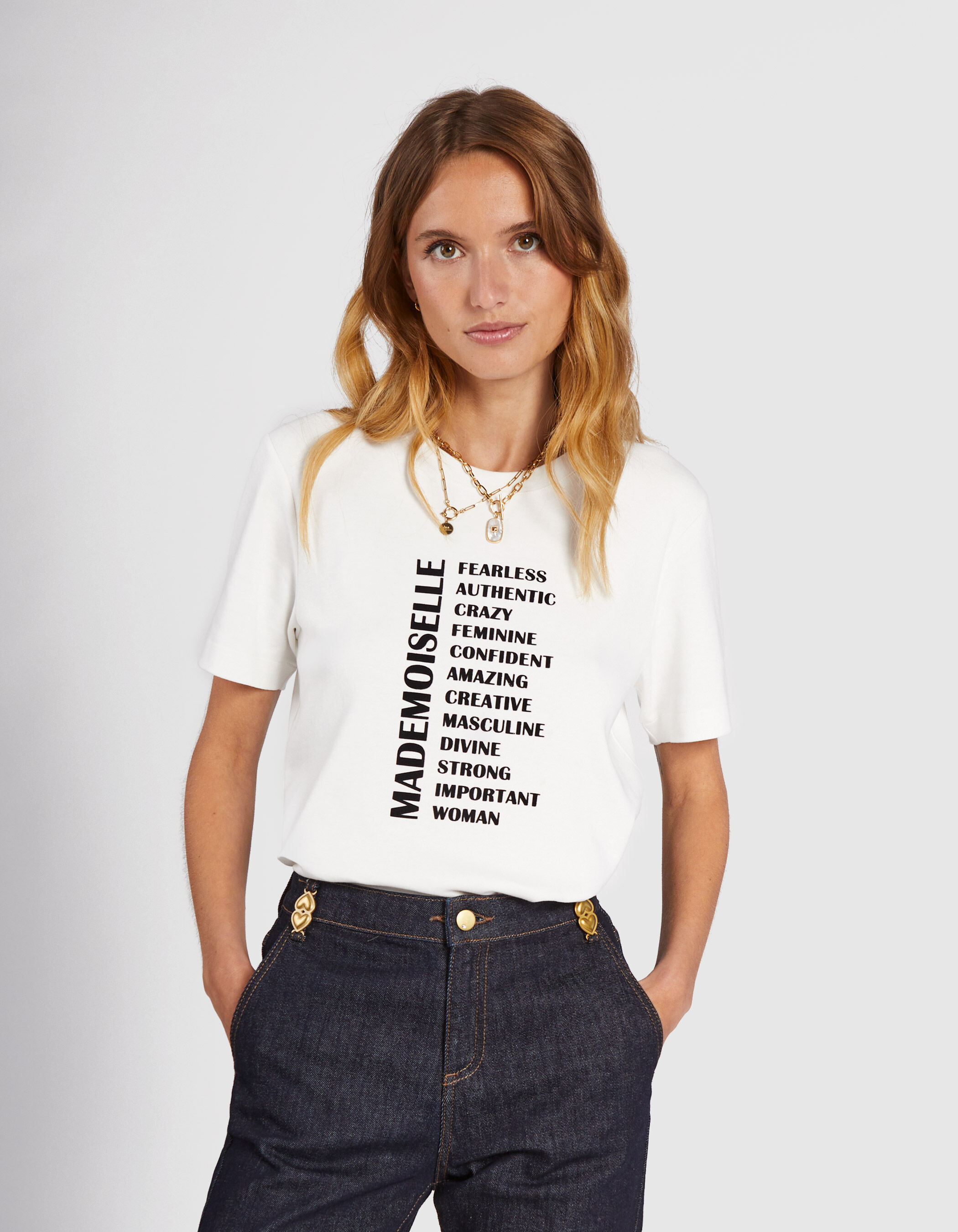 Gebroken wit T shirt met zwarte tekst