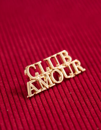 I.Code gold metal slogan brooch