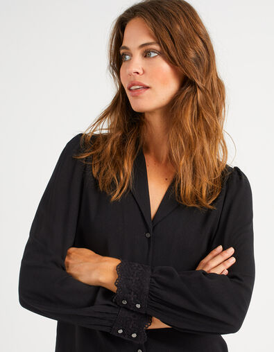 Schwarze Bluse mit bestickten Manschetten I.Code