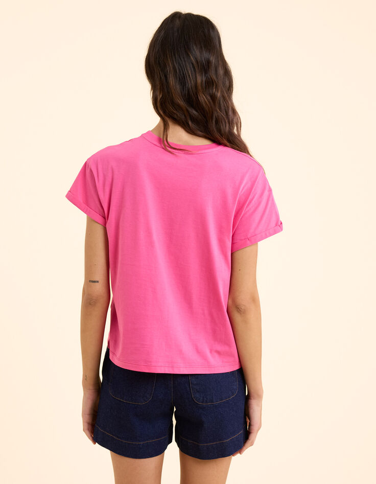 Camiseta rosa con mensaje visual de palmera I.Code-5